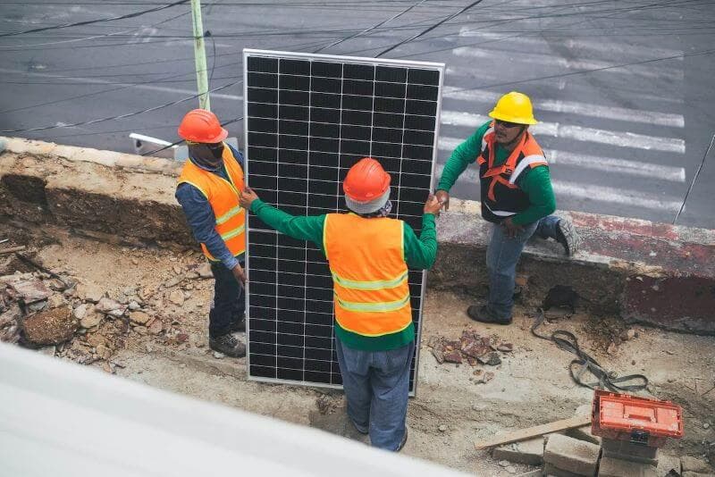 A raw camera view of workers on a construction site