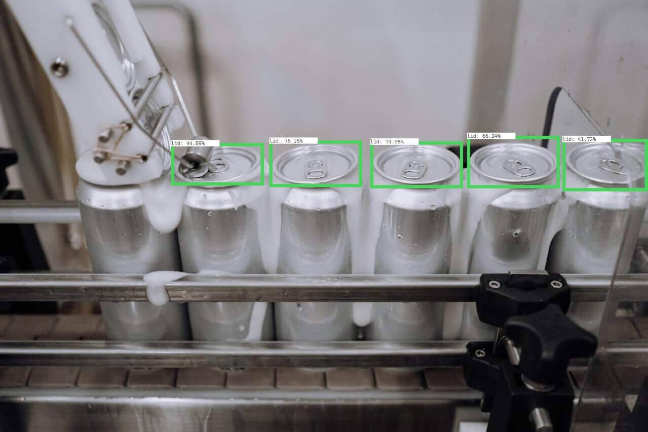 Alumimium cans on a conveyor system.